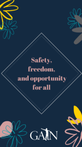 blue wallpaper with flowers that reads safety freedom and opportunity for all